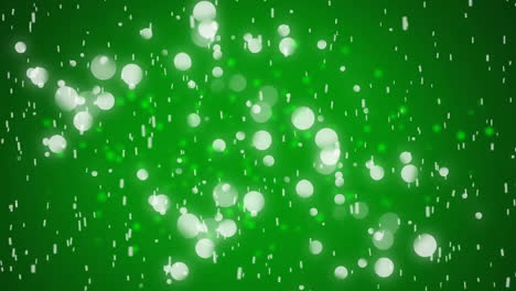 animation of white spots moving on green background