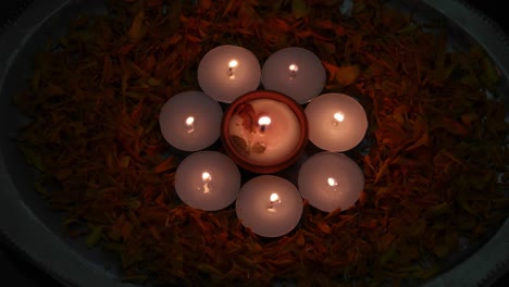 hands lit a diyas or lamps lit up for diwali 'festival of light', the most important ancient hindu festival celebrated signifying victory of light over