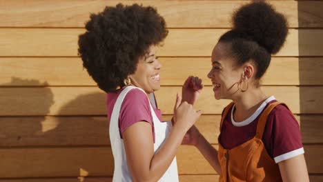 Two-mixed-race-women-hugging