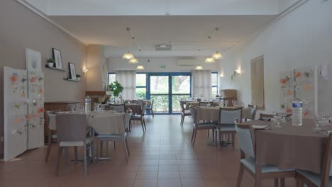 dining room and tables set with glassware and dishes in the nursing home, a comfortable and cozy place