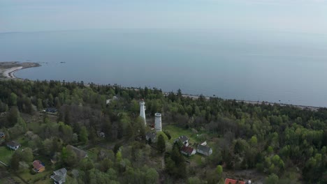 Aerial-of-the-Jomfruland-Lighthouse-It-is-a-coastal-lighthouse-located-on-the-island-of-Jomfruland-in-Kragerø,-Norway