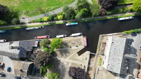 Aerial-drone-video-footage-of-a-small-industrial-town-in-the-North-of-England-called-Hebden-Bridge,-Halifax,-West-Yorkshire