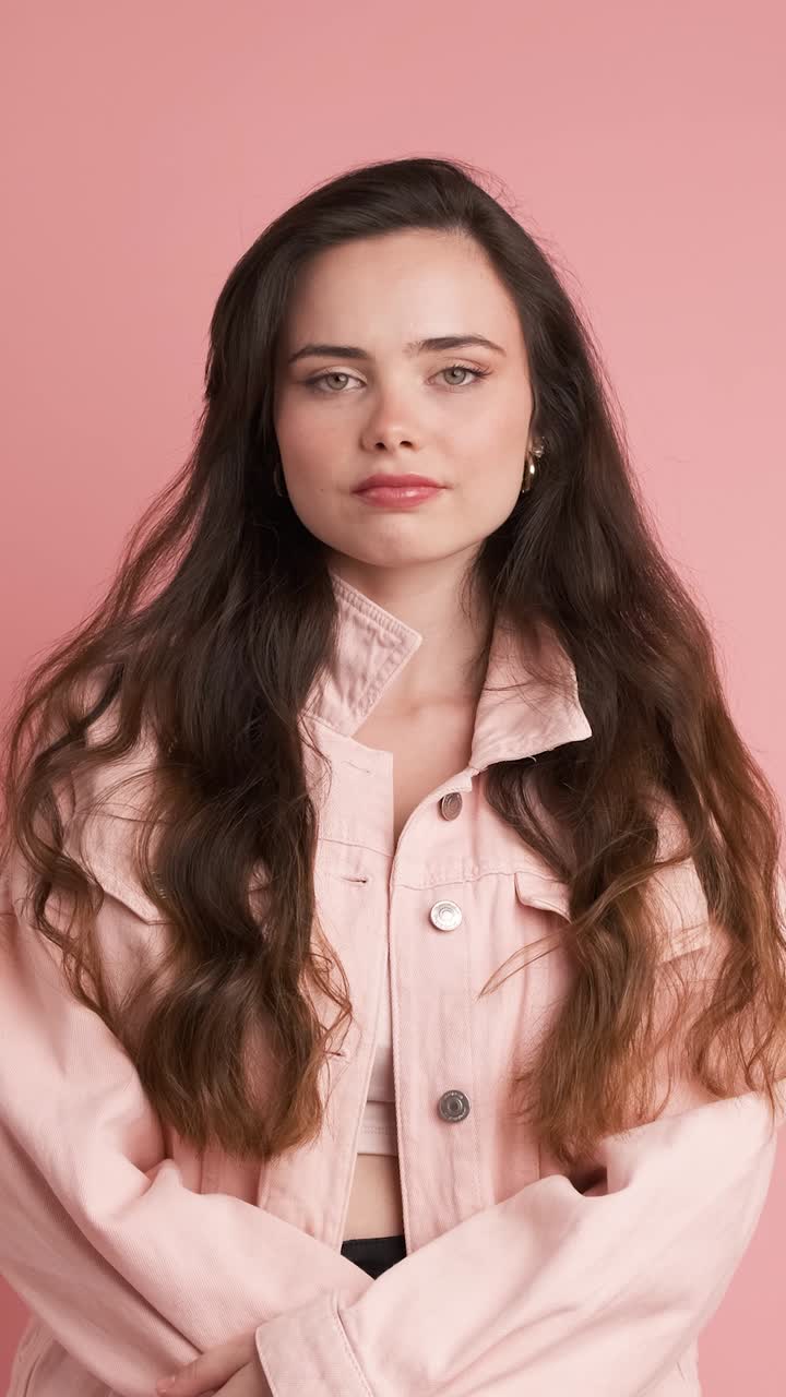 Portrait of woman looking around with thoughtful expression