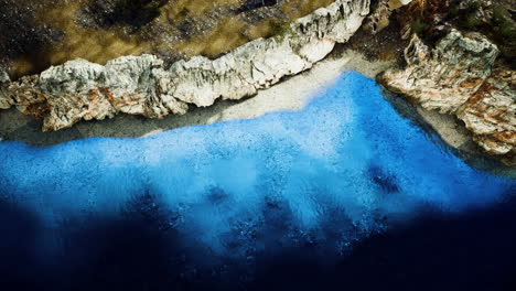 aerial view from flying drone of rocky island in atlantic ocean