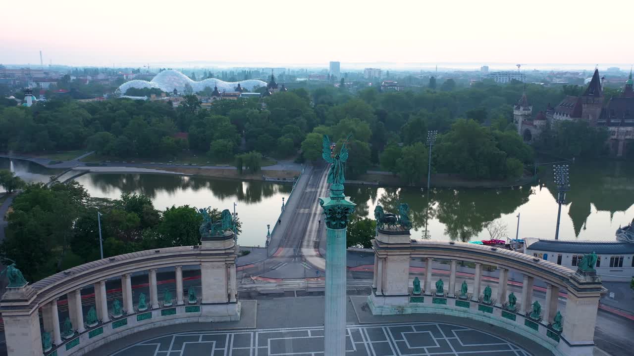 Drone footage of the empty Heroe's Square in Budapest, Hungary at the time of the Covid virus. Early morning at the sunrise in spring.
Drone circles to the right.