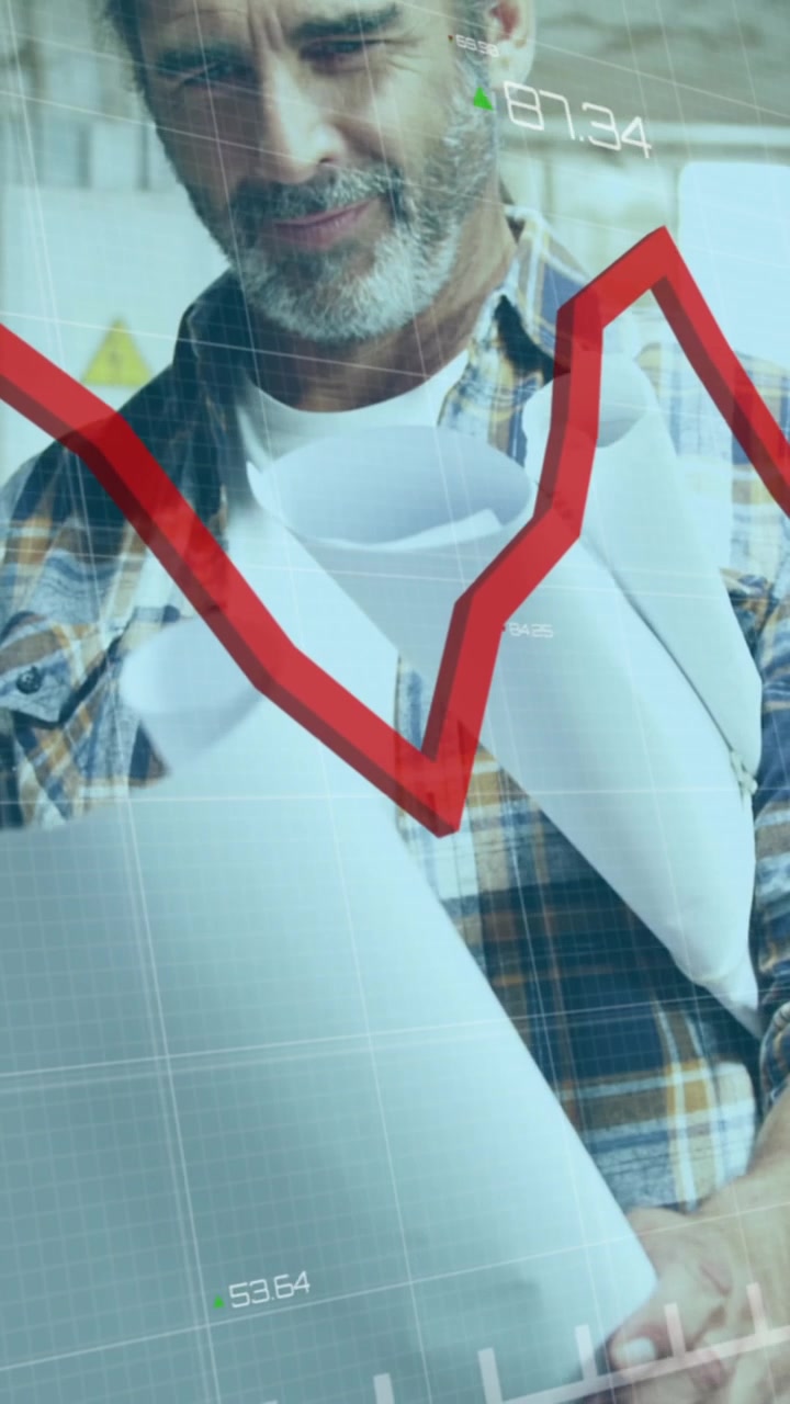Animation of red graph processing over mature caucasian male carpenter with blueprints in workshop