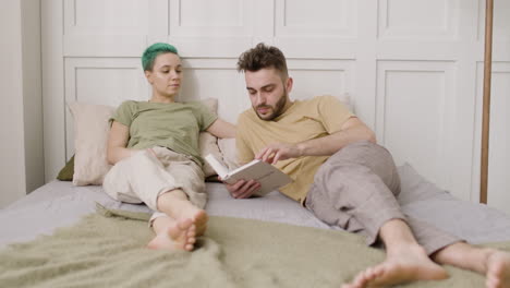 loving couple relaxing on the bed at home