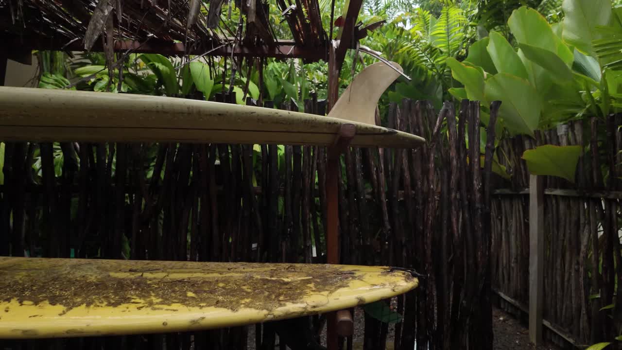 Surfboard water sport old forgotten covered in dirt patina shop storage