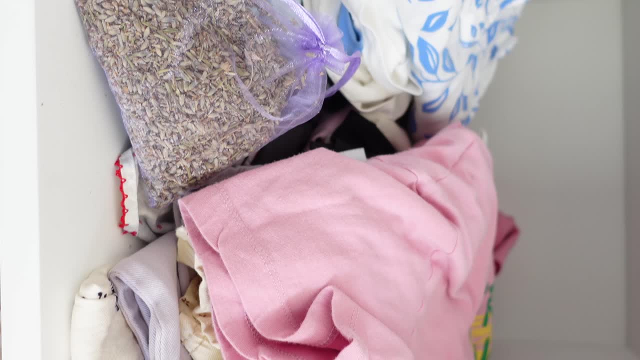 Lavender bag in a drawer with clothes