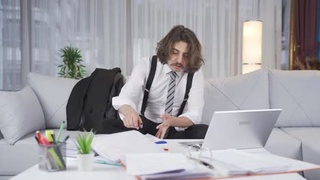 tired businessman trying not to sleep.