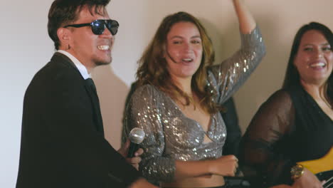 clip of a musical band performing live at a social event or party.