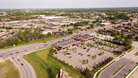 Vehicles-Driving-At-The-Novi-Road-Near-Crescent-Boulevard-In-Michigan,-USA