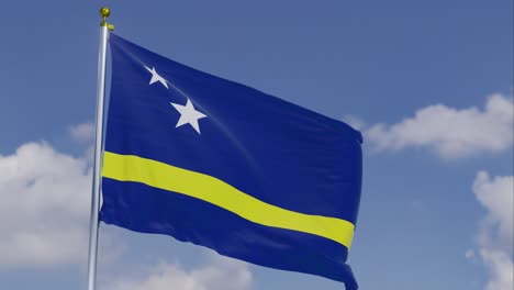 Flag-Of-Curaçao-Moving-In-The-Wind-With-A-Clear-Blue-Sky-In-The-Background,-Clouds-Slowly-Moving,-Flagpole,-Slow-Motion