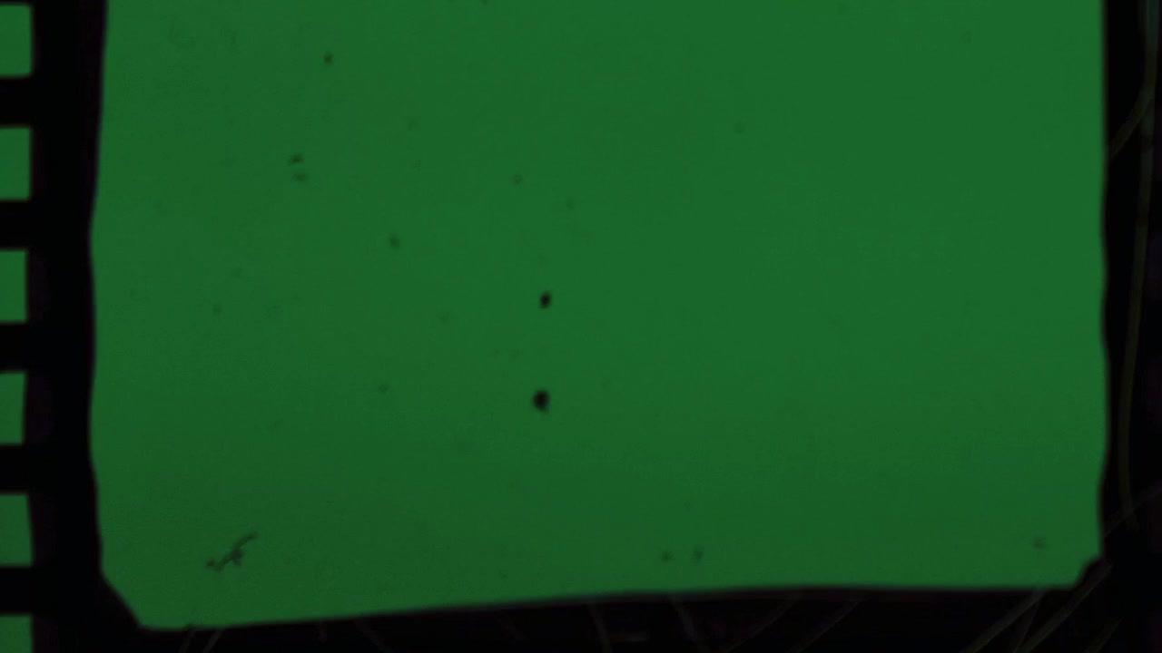 Vintage Film Reel Frame Transition with Green Screen Background