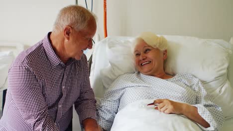 senior man interacting with senior woman