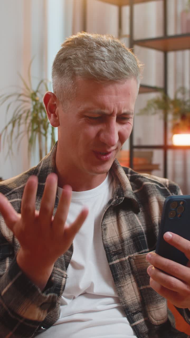 Sad displeased man using smartphone surprised lottery game results bad news fail deadline virus