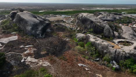impressive stone formations rise from the landscape in chaval, ceará, brazil