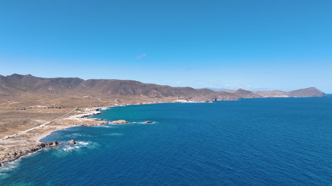 Summer aerial above Cabo de Gata Nijar National Park's extraordinary coastline