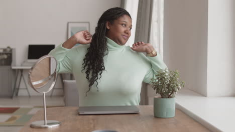 young african businesswoman finishing work