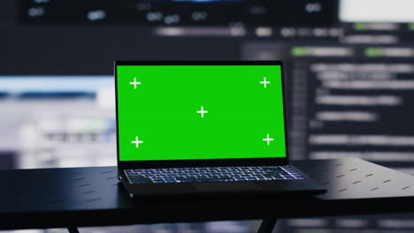 laptop in empty space shows copy space screen surrounded by data