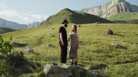 couple hiking in mountains