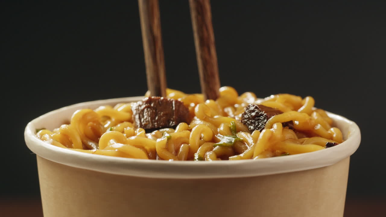 Cup of Beef Ramen with Chopsticks