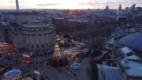 liverpool city christmas market sunset evening skyline aerial rising view above st georges square