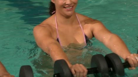 pregnant women using weights in the pool