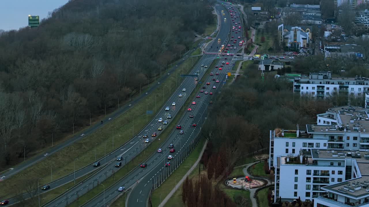 Warsaw City traffic, Wal Miedzeszynski route, urban nature, sunset scene