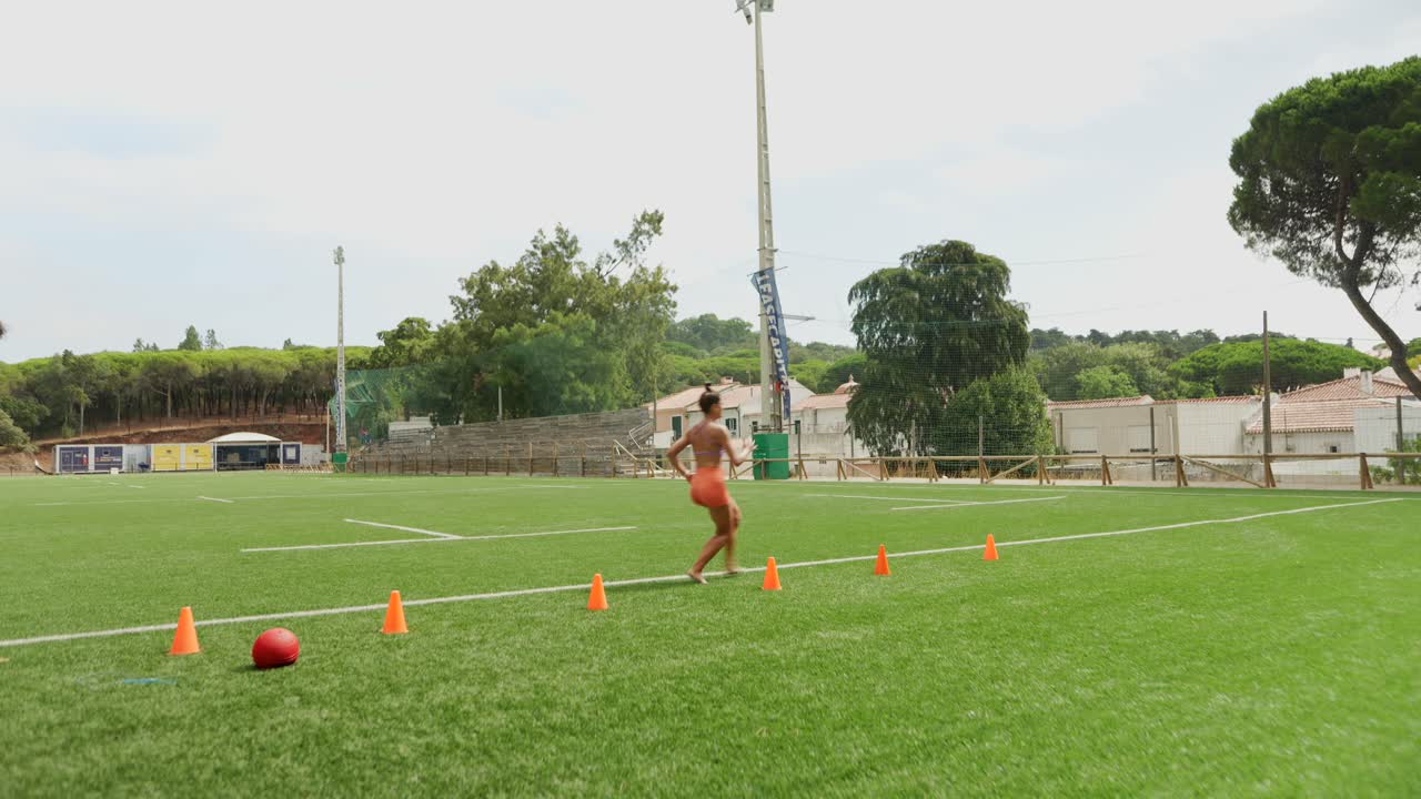 People exercising on football field