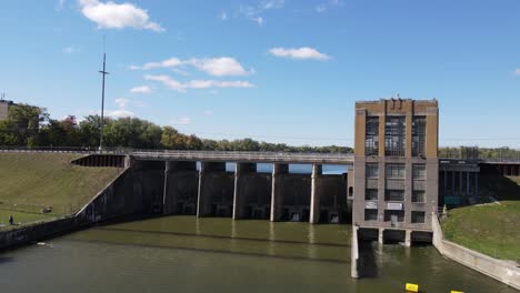 ypsilanti hydroelectric dam building complex and bridge, aerial ascend view