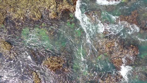 aerial view of rocky coastline and turquoise water