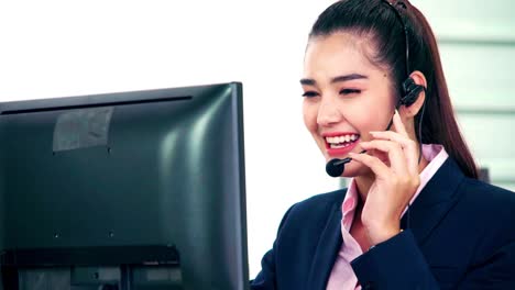 Business-people-wearing-headset-working-in-office