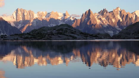 A-stunning-and-colorful-sunset-view-of-Monte-Bianco-mountain-range-and-the-amazing-Lac-Blanc-lake-in-the-France-Alps-of-Europe