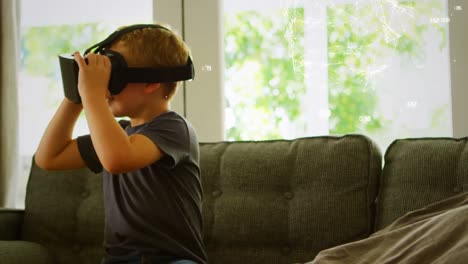 Animation-Eines-Globus-Mit-Netzwerk-Von-Verbindungen-über-Einem-Jungen,-Der-Ein-VR-Headset-Verwendet