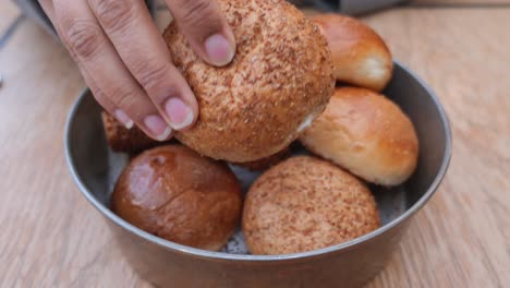 close up of fresh bread rolls in a basket