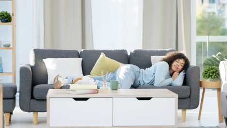 relaxing, tired young girl going to sleep on sofa