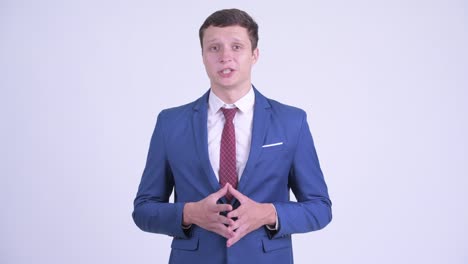 슈트 입은 잘생긴 젊은 사업가
