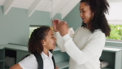 School,-bag-and-mother-with-girl-ready-to-leave