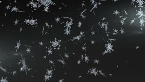 copos de nieve cayendo contra un fondo negro