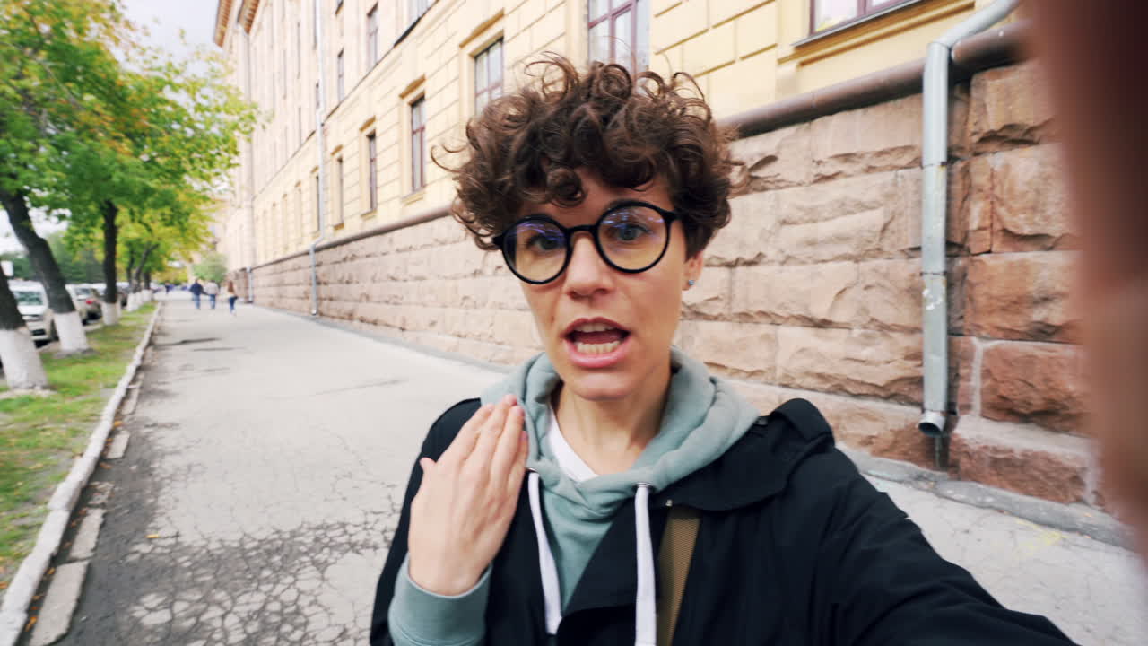 Woman Taking Selfie on City Street