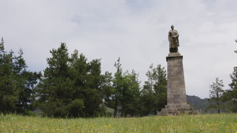 calm, natural surroundings of shota rustaveli statue - famous georgian poet