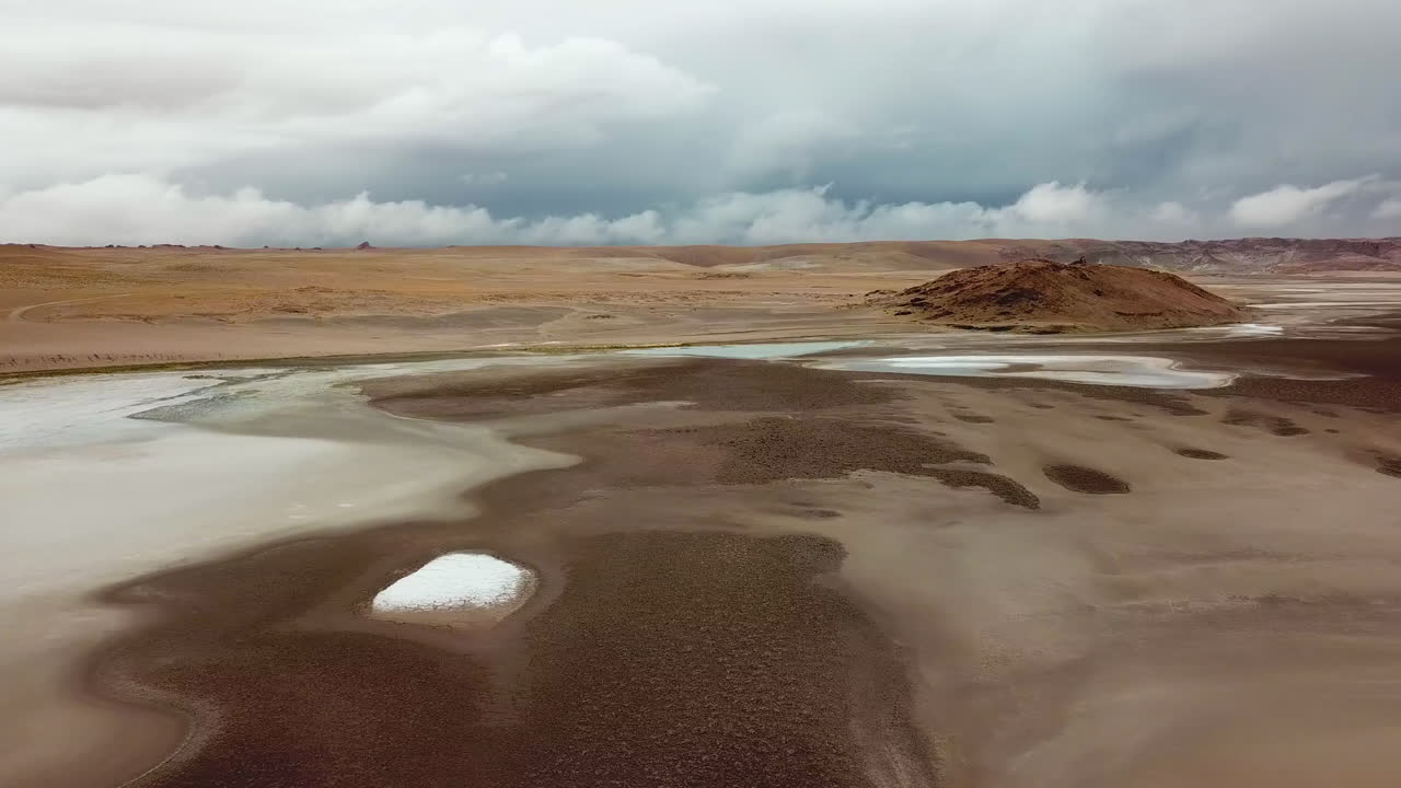 Another Planet Landscape on Earth, Drone Aerial View of Salt Flats in Los Flamencos National Reserve, Slopes of Atacama Desert, Chile