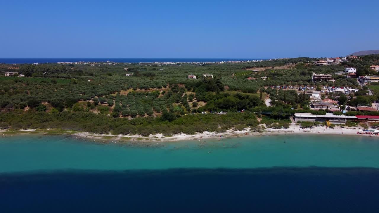 Kournas natural freshwater lake and surrounding vegetation, Drone shot