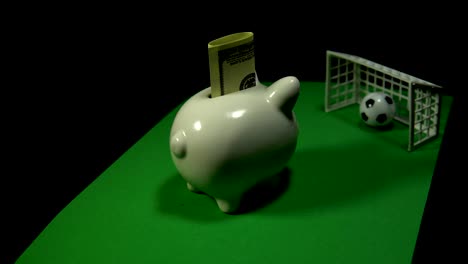 concept of money and sports, savings for a trip to a match, betting on football.