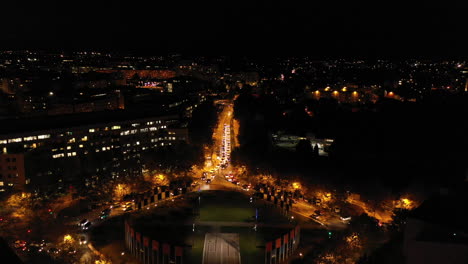 Roundabout-aerial-view-Port-marianne-Montpellier-night-lights-traffic-with-cars