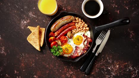 delicious english breakfast in iron cooking pan