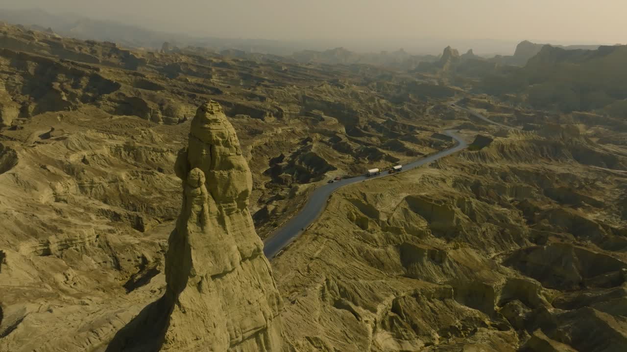 Cinematic drone shot of road and mountain in buzi pass top Makran coastal Highway Balochistan