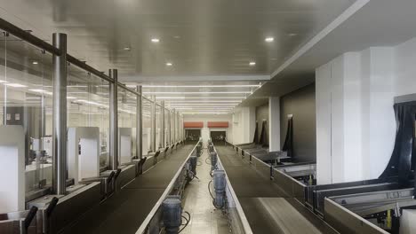 baggage conveyor belt of check-in counters at airport terminal