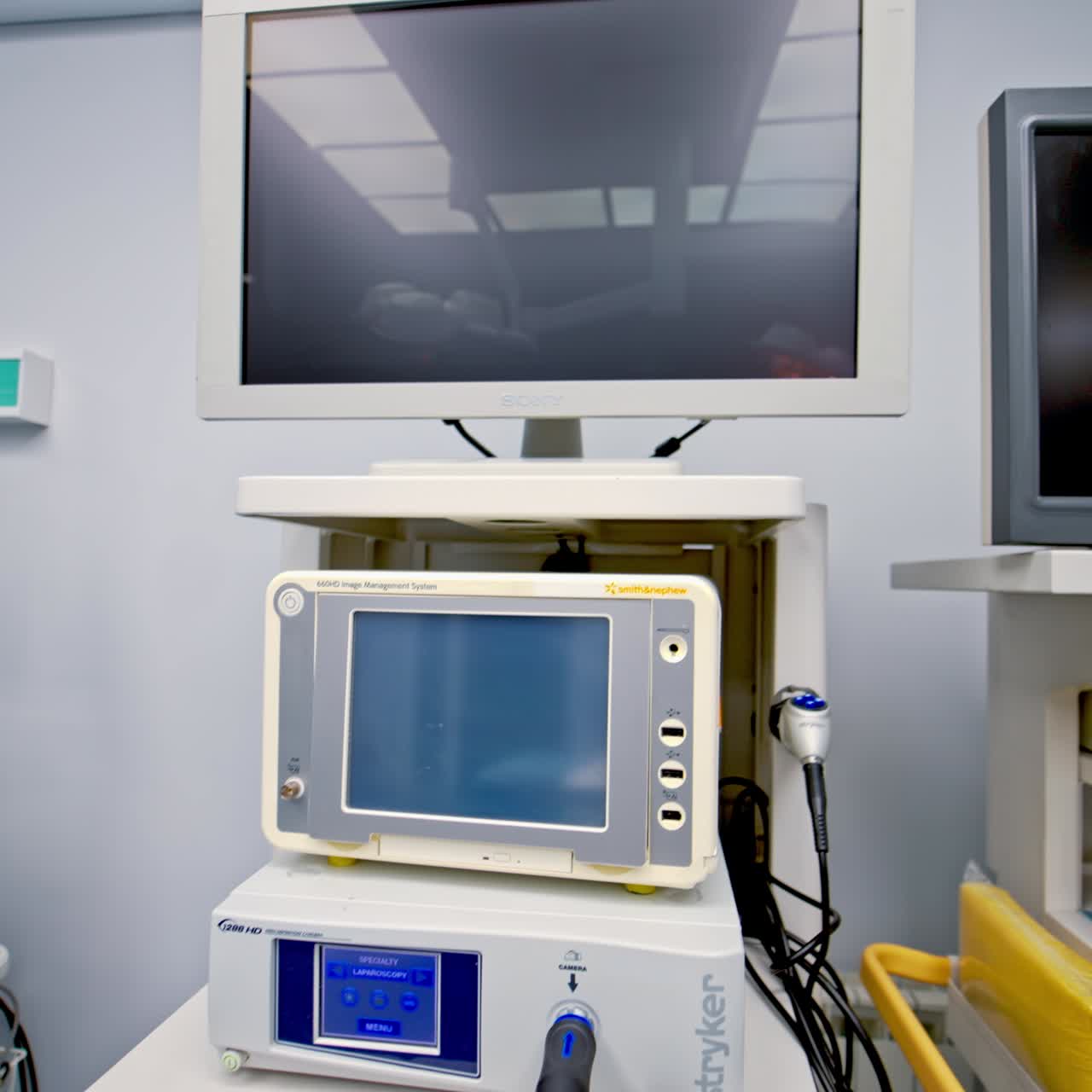 Diverse technological equipment for modern surgeries in hospital. Close look at the apparatuses and devices rising from floor and up